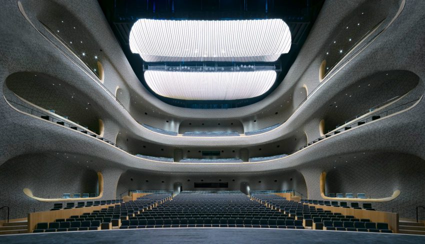 The Opera Hall is designed for a 1600 seat audience. The shape is fully generated with the help of acoustic scripting tools, and the complex 3000m2 double-curved surface is clad with about 1.5 million custom developed ceramic tiles.