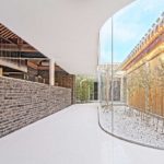 Kitchen and Glass Curvy Corridor - Tea House in Hutong / Arch Studio