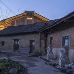 Looking from the deserted house to the building - Party and Public Service Center of Yuanheguan Village / LUO Studio