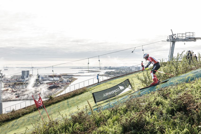 Person Skyiing in CopenHill Waste-to-Energy Plant & Sport Facility / BIG