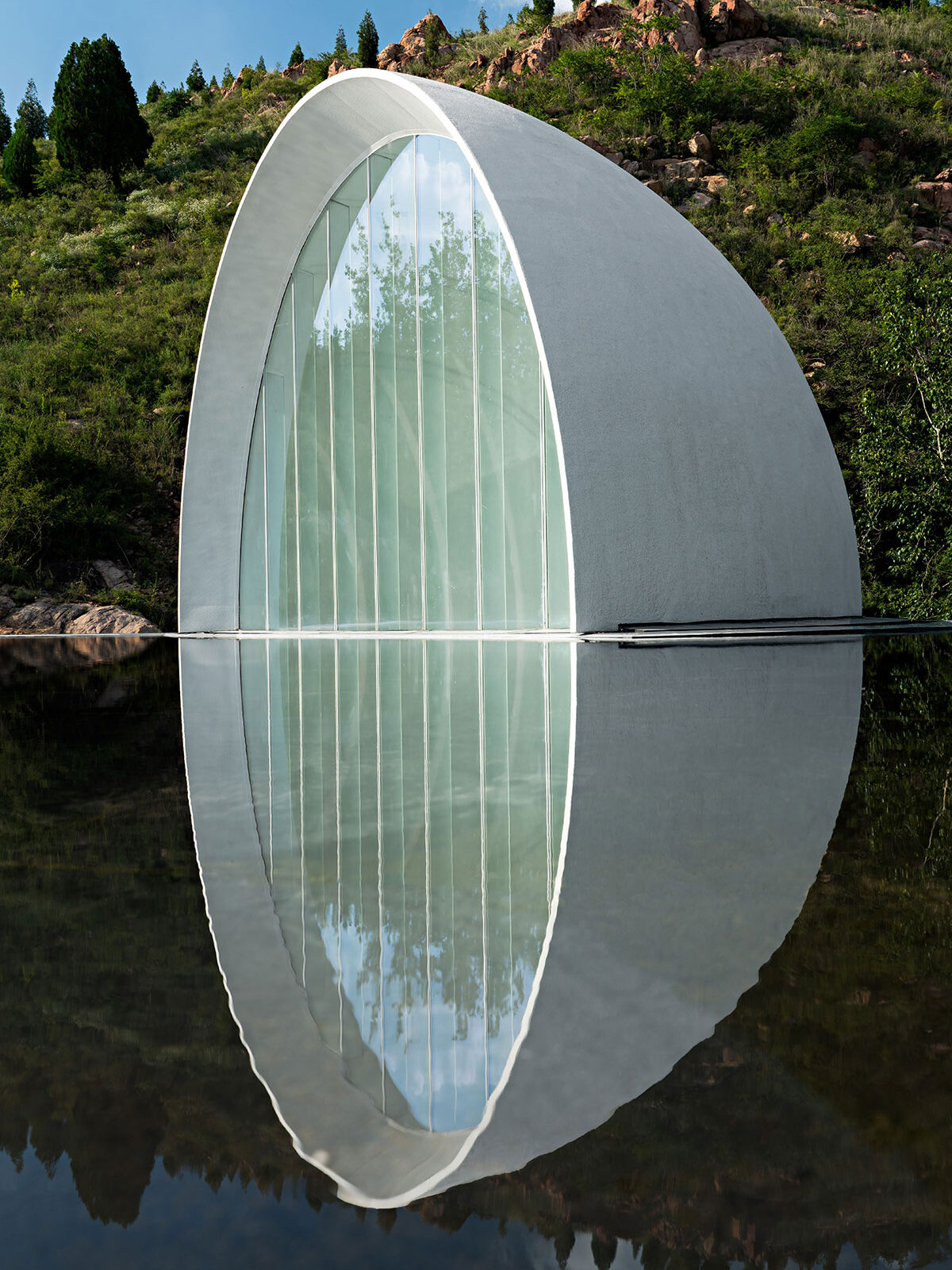 syn architects the hometown moon day light the moon light and roof pond