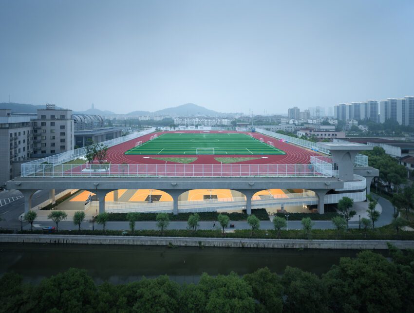 The Hexi Indoor Sports Field of Shaoxing University by UAD Architects A Sports Field Stacked Up and Down